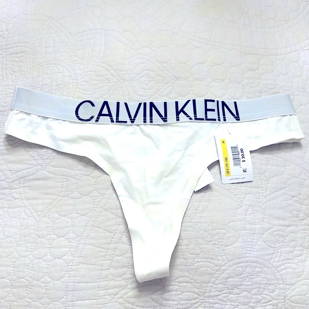 Calvin Klein White thong size Medium